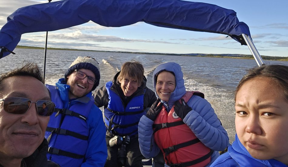 polar-adventures-inuvik-people-on-boat-enjoying-river-trip-scaled.jpg